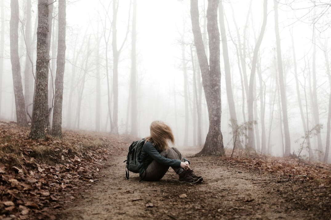 person thinking alone