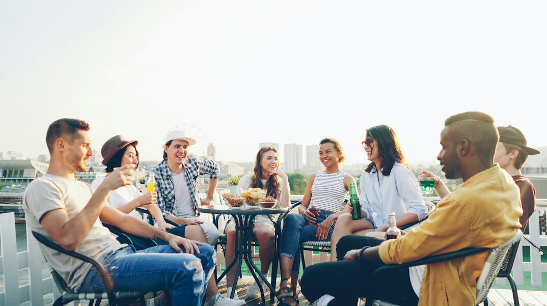 diverse group of people talking