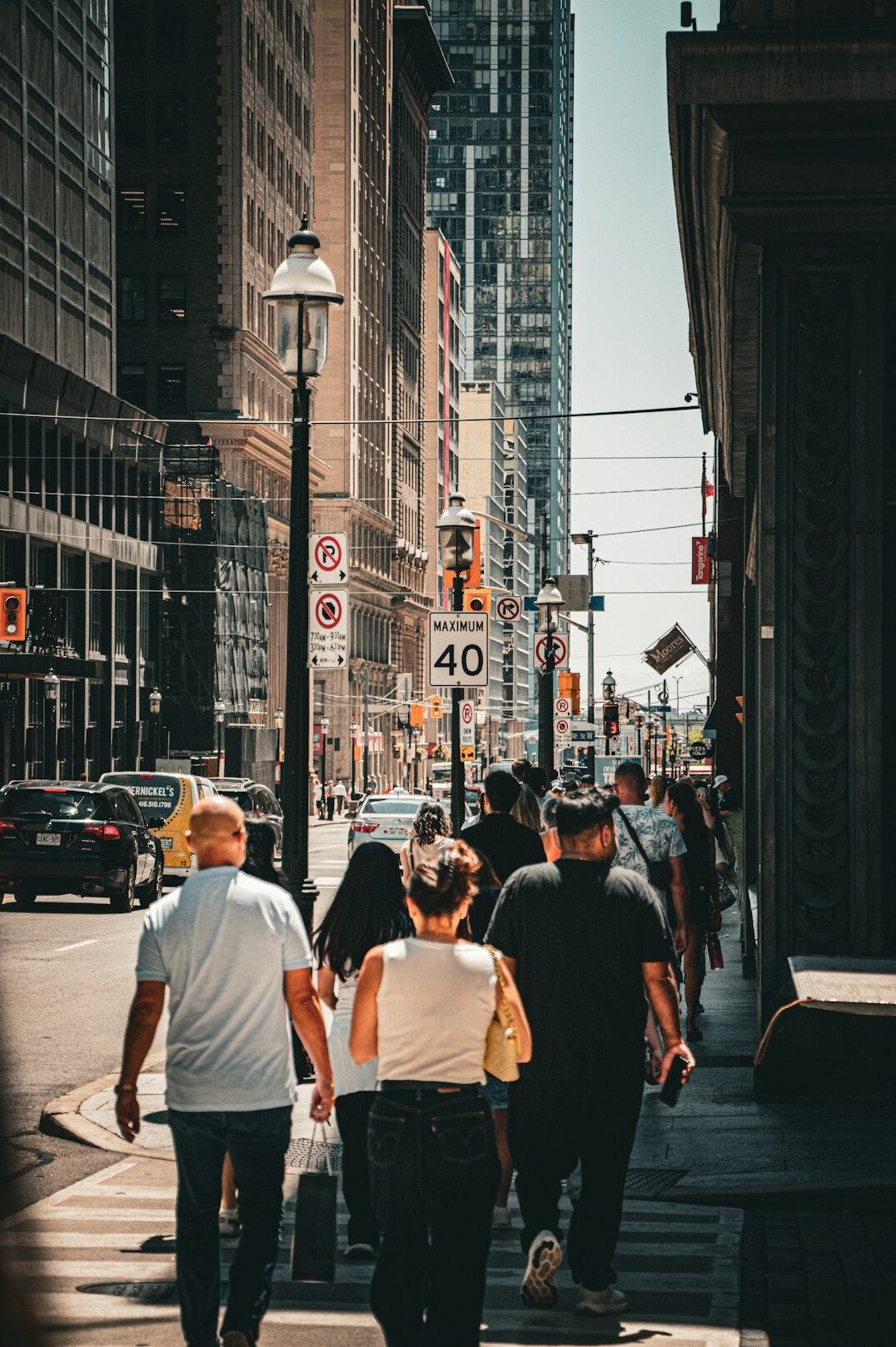 group of people walking on street